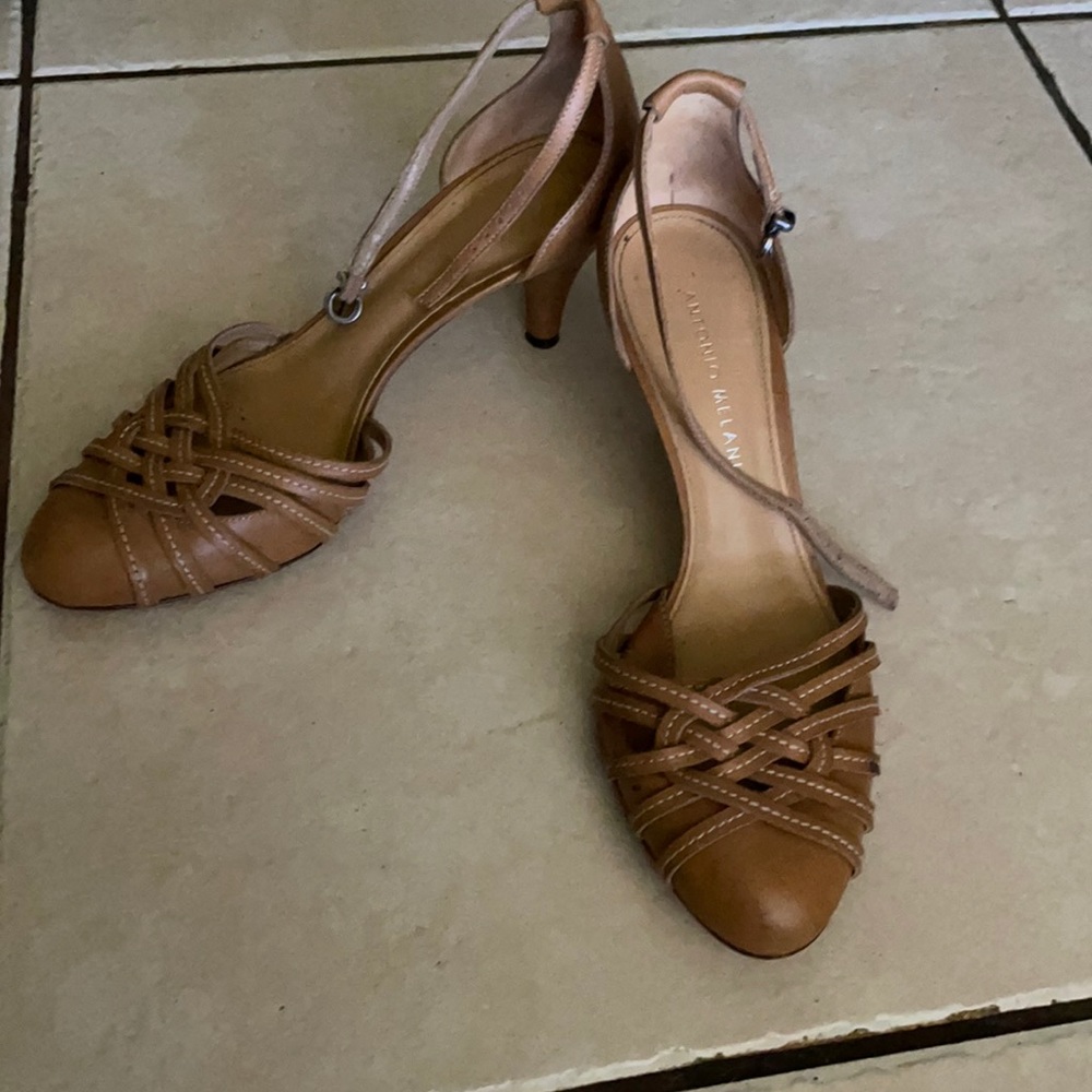 Antonio Melani tan leather upper and sole heels.  Size 7.5 medium.